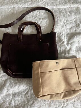 Portland leather mini crossbody tote along with organizer